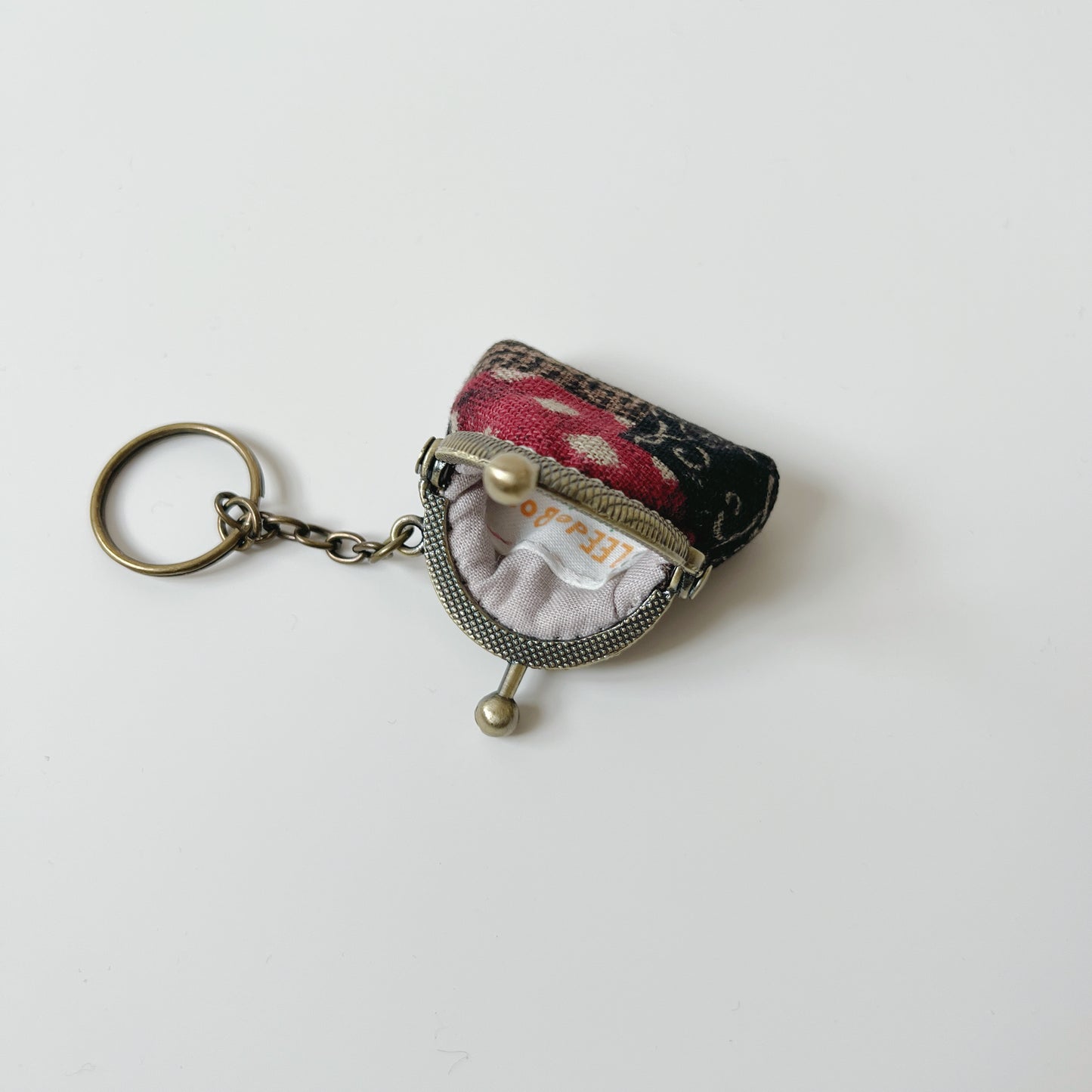 Black and Red Patches - Handsewn Half Round Tiny Kiss Lock Purse Keychain